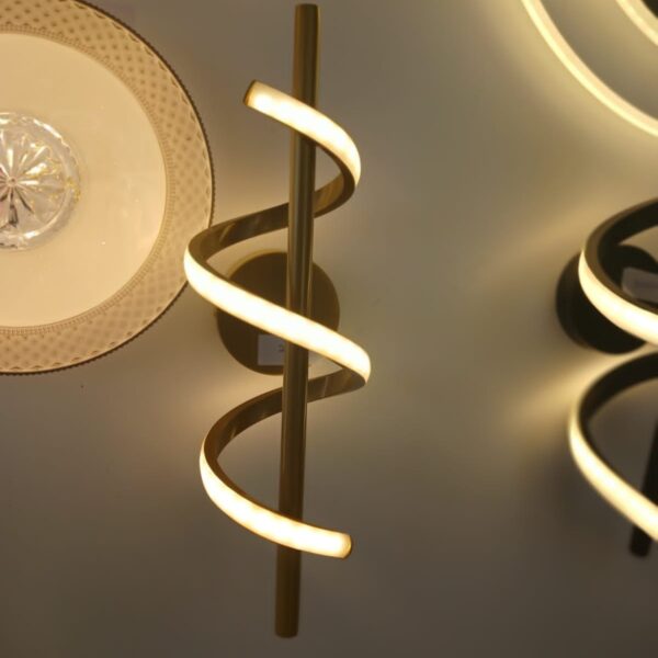 Spiral LED Wall Light Best prices in Kenya Arc Design Wall Light: The curved design and black base bring you a modern and trendy visual. This curved indoor wall light will add instant elegance to your home. Not only can it be used for lighting, but also a good choice for home decoration. High quality materials.: This modern indoor wall light is made of high quality copper and silicone, it is smooth, sturdy, safe, non-fading, easy to clean, which is corrosion-resistant and durable, and has a long service life.